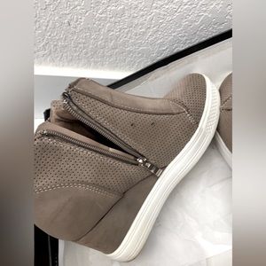 High top sneakers. Please see pics for details